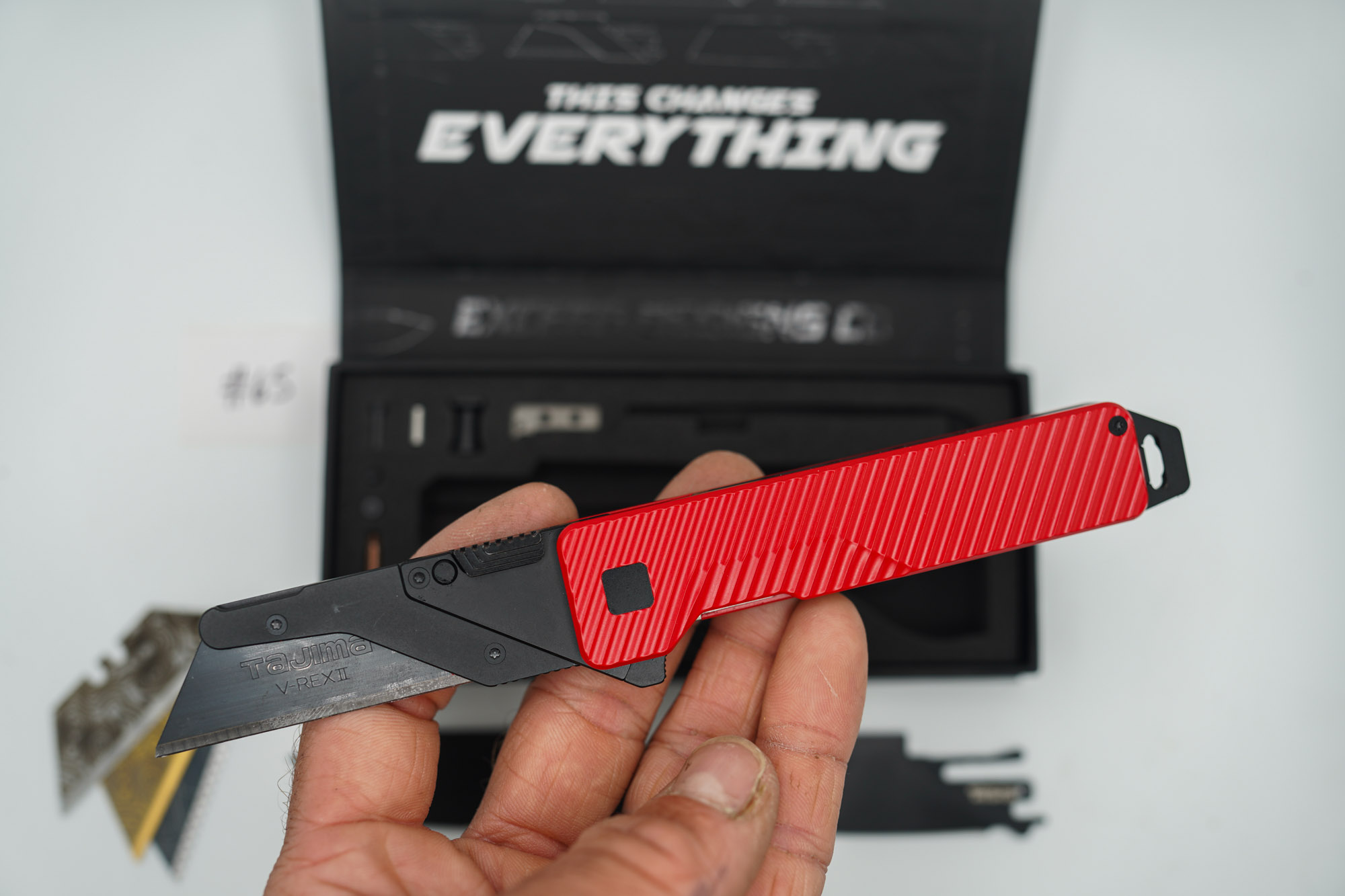 BUILD #65 — Condition 9/10 — TiRant ULTRA Dual Milled SLASH W/Custom Bright Red Cerakote + Installed Full-Length Skeleton Stonewash Pry Bar Backspacer + Original Box W/ Spare Jet-Black PVD Hardware Kit / Lock Bar insert + D2 Jet-Black Tanto Hotswap Blade + D2 Jet-Black Drop Point Hotswap Blade + 3X Custom Laser Engraved Razor Blades - Image 4