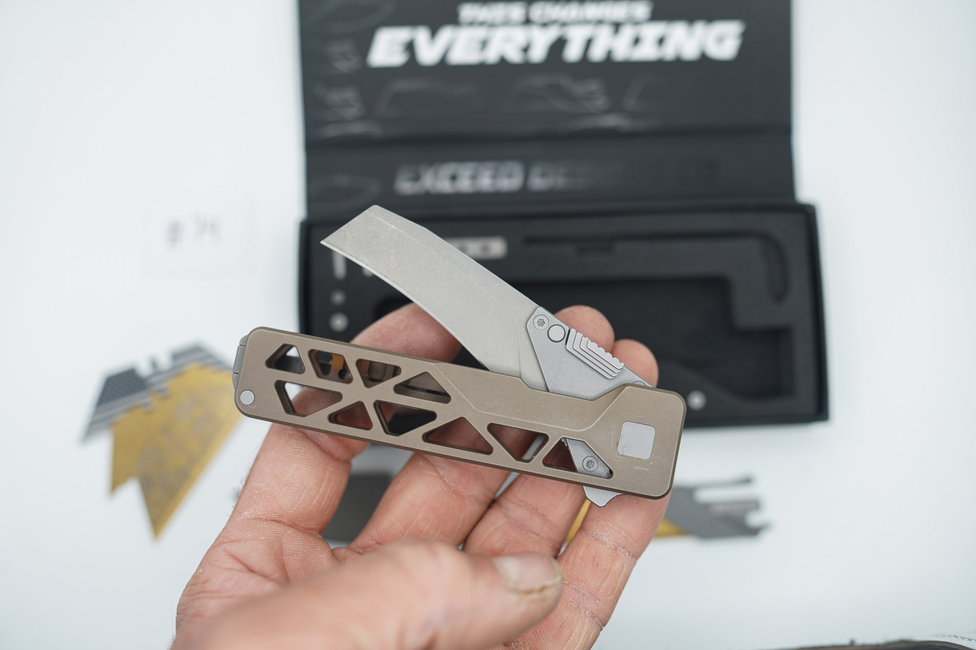 BUILD #74 — Condition 8/10 — TiRant ULTRA Skeleton 'SKULTRA' Centurion Bronze W/Blasted Grey Hardware + Original Box W/Spare Grey Blasted Hardware Kit / Lock Bar insert + D2 Hawkbill Hotswap Blade + D2 Stonewashed Drop Point Hotswap Blade + 3X Custom Laser Engraved Razor Blades - Image 5