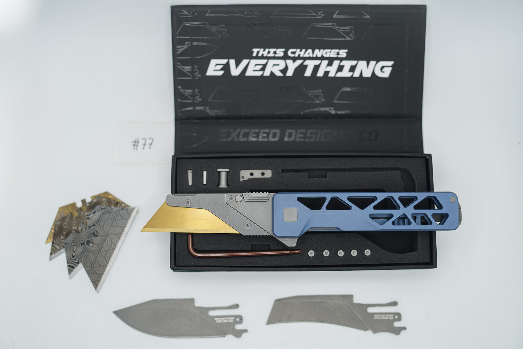 BUILD #77 — Condition 9/10 — TiRant ULTRA Skeleton 'SKULTRA' Custom Aqua-BLUE Titanium ANO W/Blasted Grey Hardware + Original Box W/Spare Grey Blasted Hardware Kit / Lock Bar insert + D2 Stonewashed Hawkbill Hotswap Blade + D2 Stonewashed Drop Point Hotswap Blade + 4X Custom Laser Engraved Razor Blades - Image 2