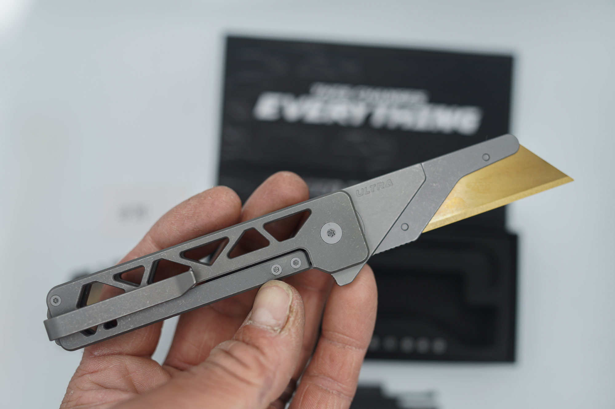 BUILD #80 — Condition 9/10 — TiRant ULTRA Skeleton 'SKULTRA' Dark Wash Titanium W/Blasted Grey Hardware + Original Box W/Spare Grey Blasted Hardware Kit / Lock Bar insert + M390 1.5MM Full RAZOR Hotswap Blade (Minor Blem, See Photos) + D2 Jet-Black Tanto Hotswap Blade + 3X Custom Laser Engraved Razor Blades - Image 3