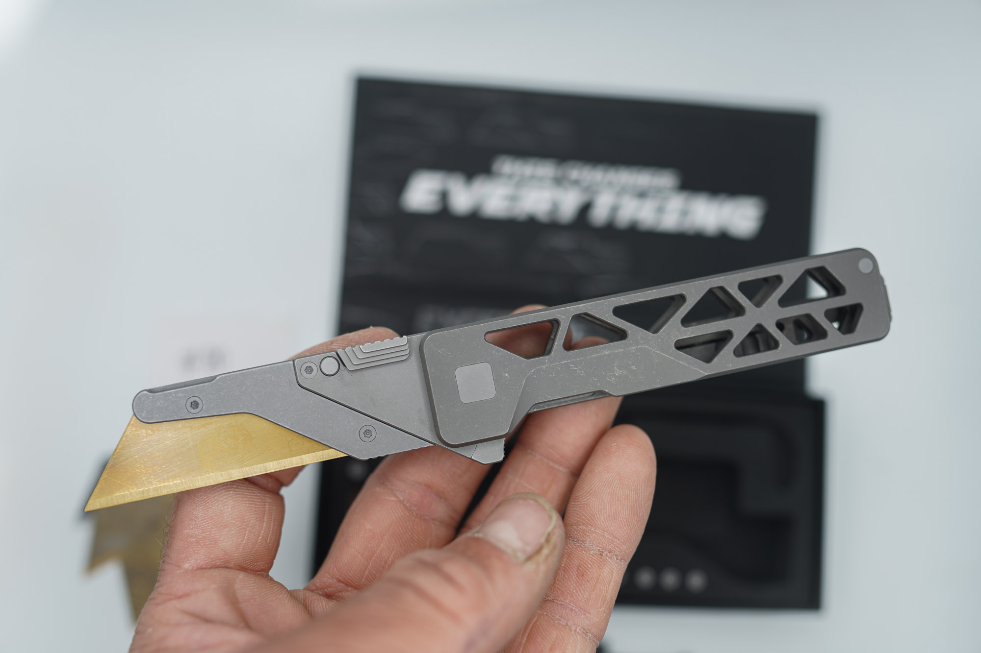 BUILD #80 — Condition 9/10 — TiRant ULTRA Skeleton 'SKULTRA' Dark Wash Titanium W/Blasted Grey Hardware + Original Box W/Spare Grey Blasted Hardware Kit / Lock Bar insert + M390 1.5MM Full RAZOR Hotswap Blade (Minor Blem, See Photos) + D2 Jet-Black Tanto Hotswap Blade + 3X Custom Laser Engraved Razor Blades - Image 2