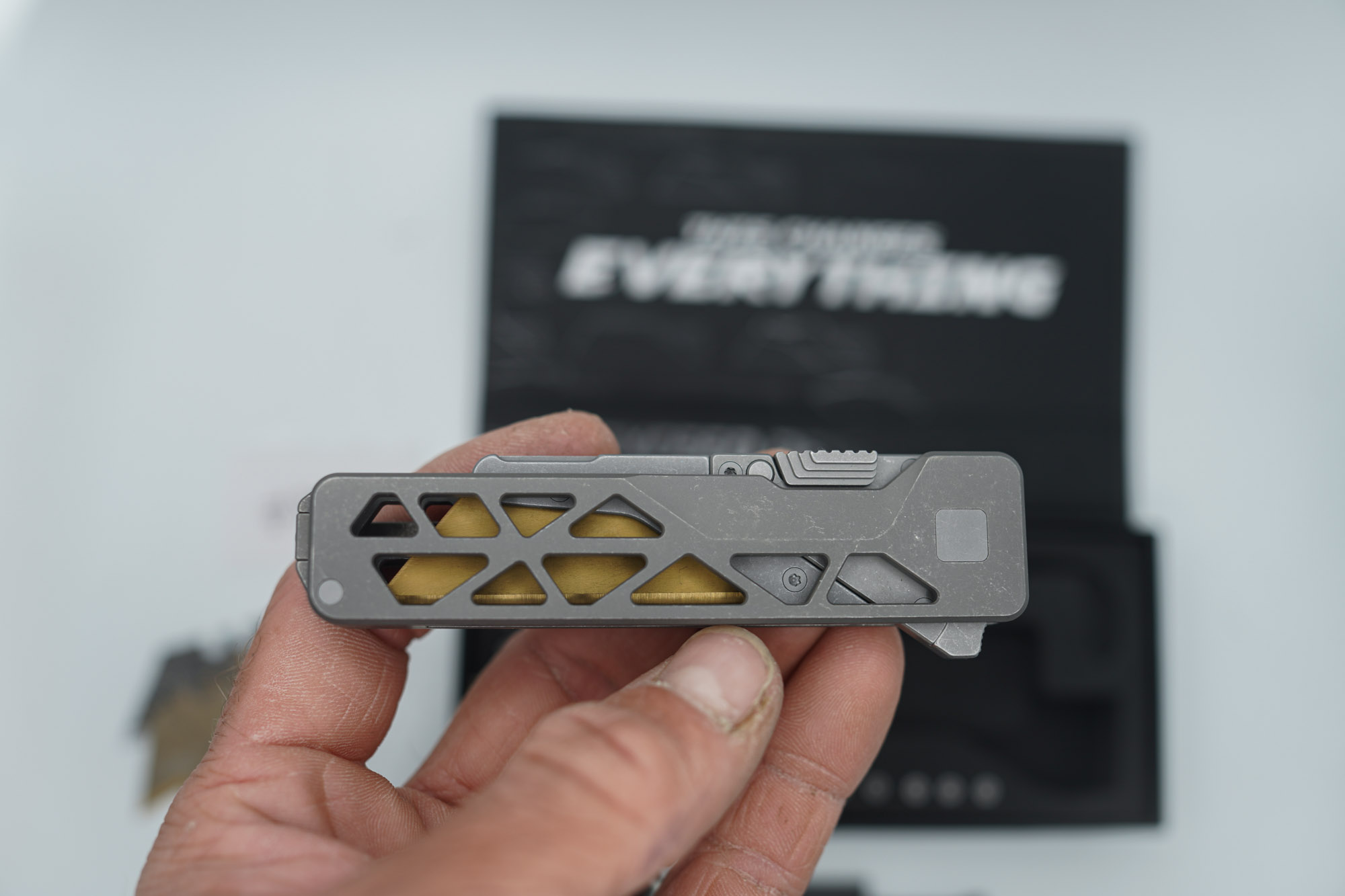 BUILD #80 — Condition 9/10 — TiRant ULTRA Skeleton 'SKULTRA' Dark Wash Titanium W/Blasted Grey Hardware + Original Box W/Spare Grey Blasted Hardware Kit / Lock Bar insert + M390 1.5MM Full RAZOR Hotswap Blade (Minor Blem, See Photos) + D2 Jet-Black Tanto Hotswap Blade + 3X Custom Laser Engraved Razor Blades - Image 4
