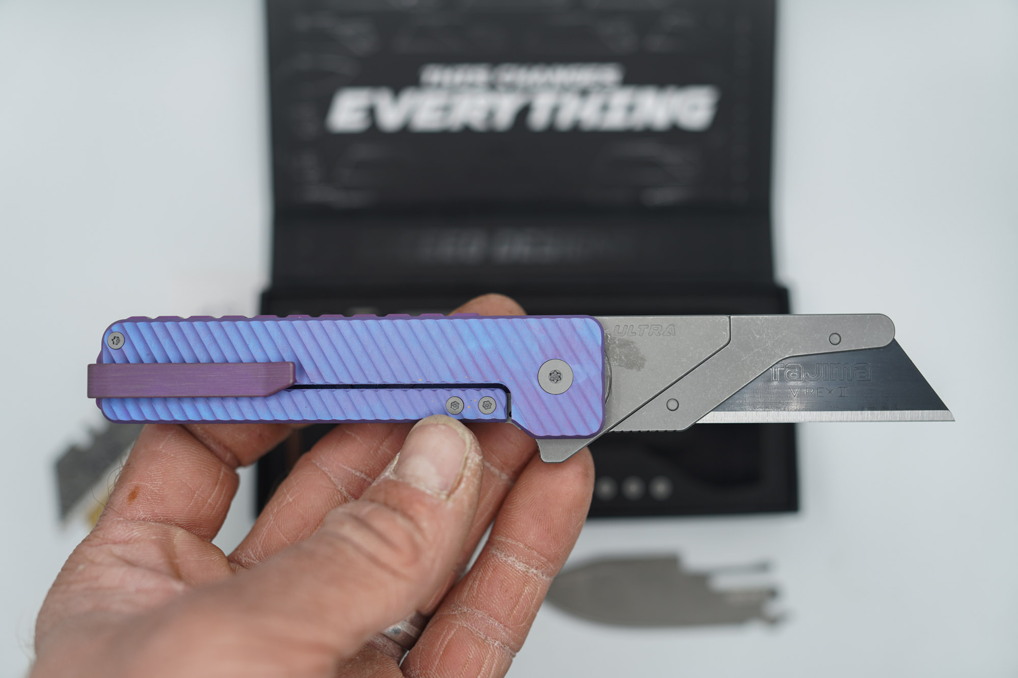 BUILD #86 — Condition 9/10 — TiRant ULTRA Dual Deep Slash MILLED + Purple & Blue ANO W/Blasted Grey Hardware + Original Box W/Spare Grey Blasted Hardware Kit / Lock Bar insert + FULL-FRAG Custom Purple-Haze ANO Ti Backspacer + D2 Jet-Black Tanto Hotswap Blade + D2 Stonewashed Drop Point Hotswap Blade + 3X Custom Laser Engraved Razor Blades - Image 6